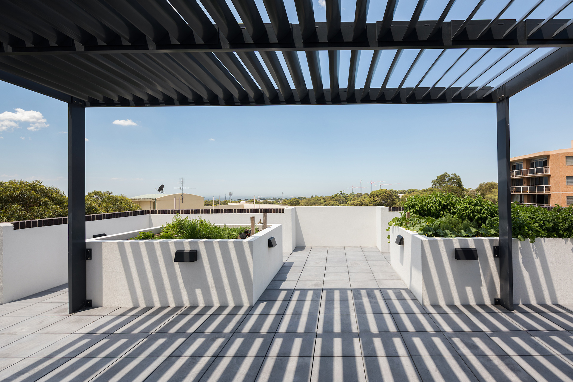 Roof top gardens with raised beds and shade frame