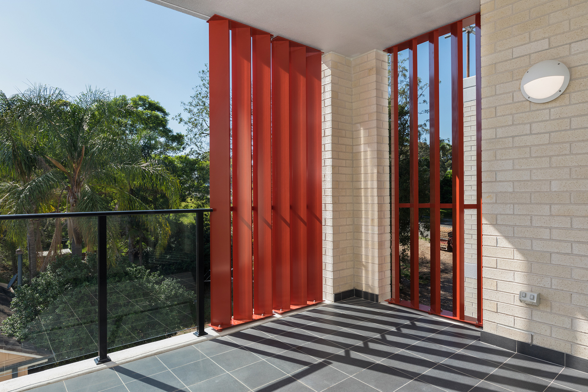 View from balcony of unfurnished unit over leafy suburb