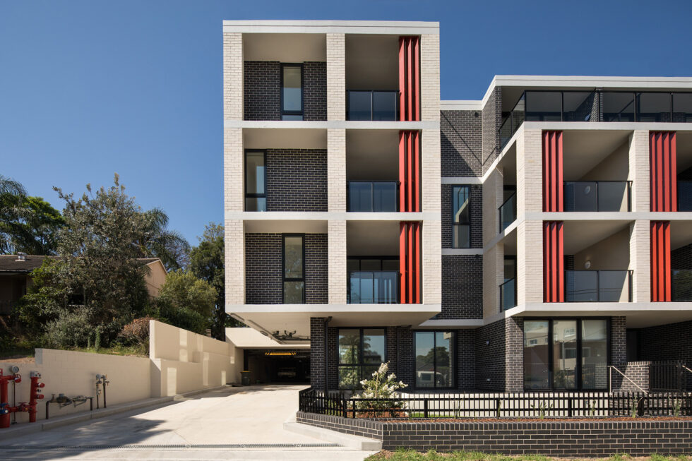 Main entrance and driveway of a four story building