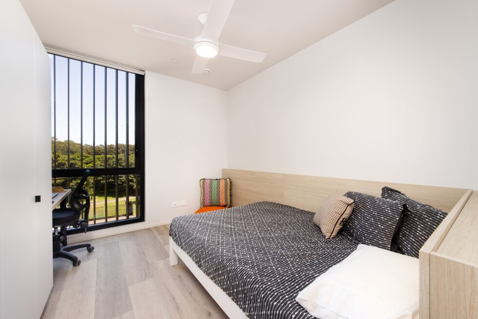 Studio apartment with bed and desk space