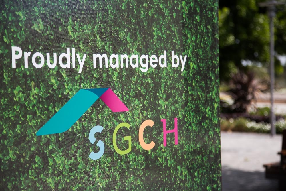 Sign that reads 'Proudly managed by SGCH'