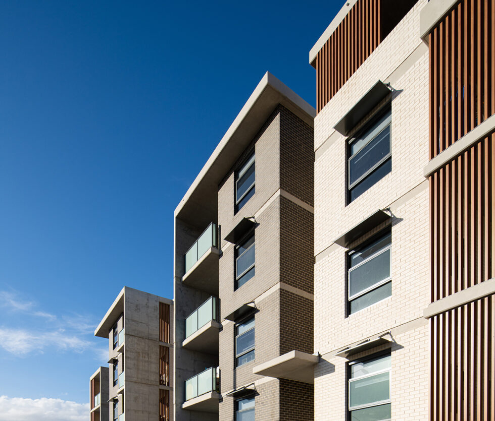 Five story building shown from the footpath