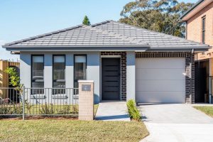 Front of a single story home and front garden